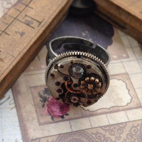 Vintage Round Watch Movement Ring with Antique Flower Charm and Swarovski Crystal Accents - The Victorian Magpie